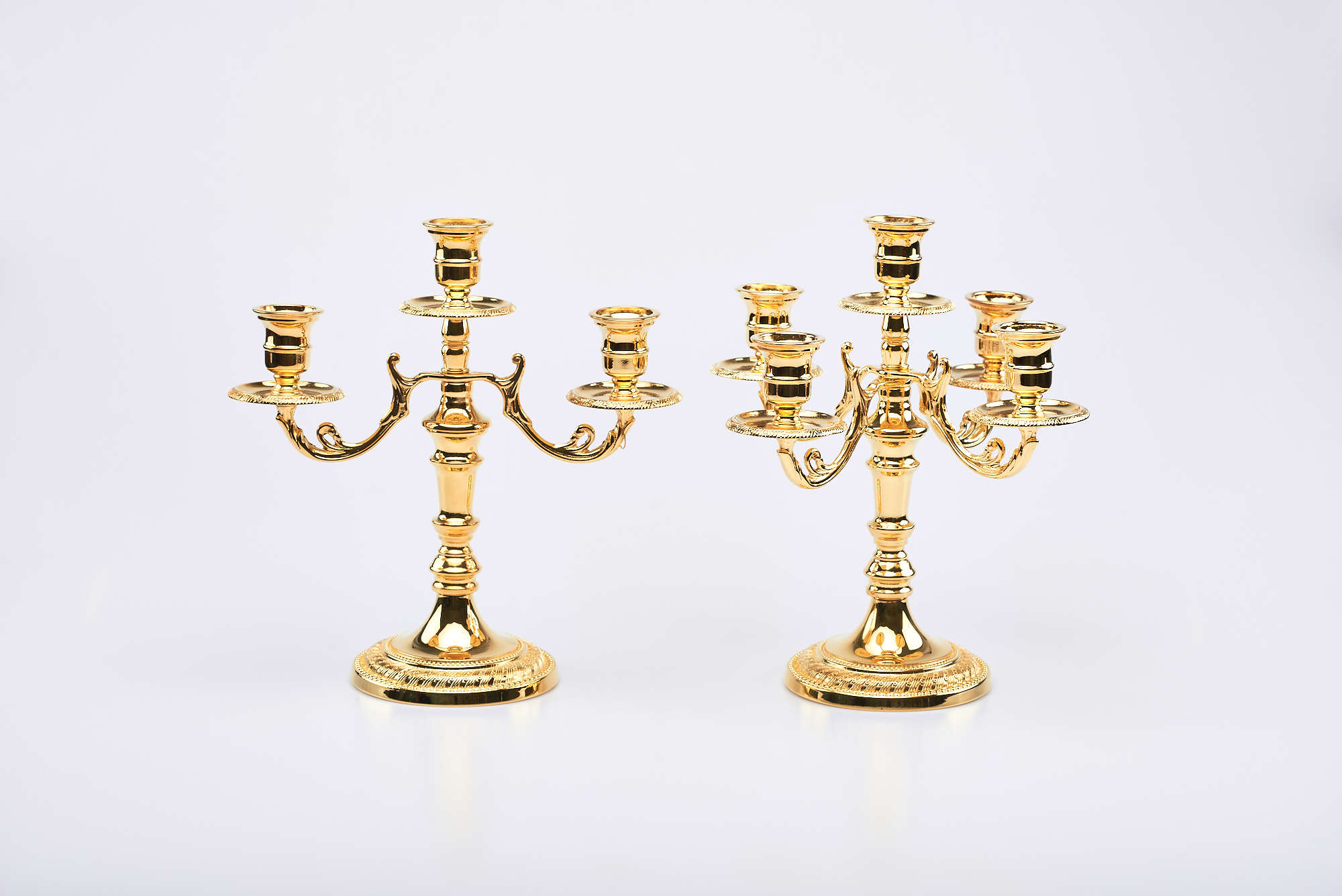 Candelabri Impero in ottone lucido